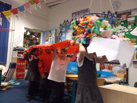 We celebrated Chinese New Year by making a big dragon and performed a dance to music.